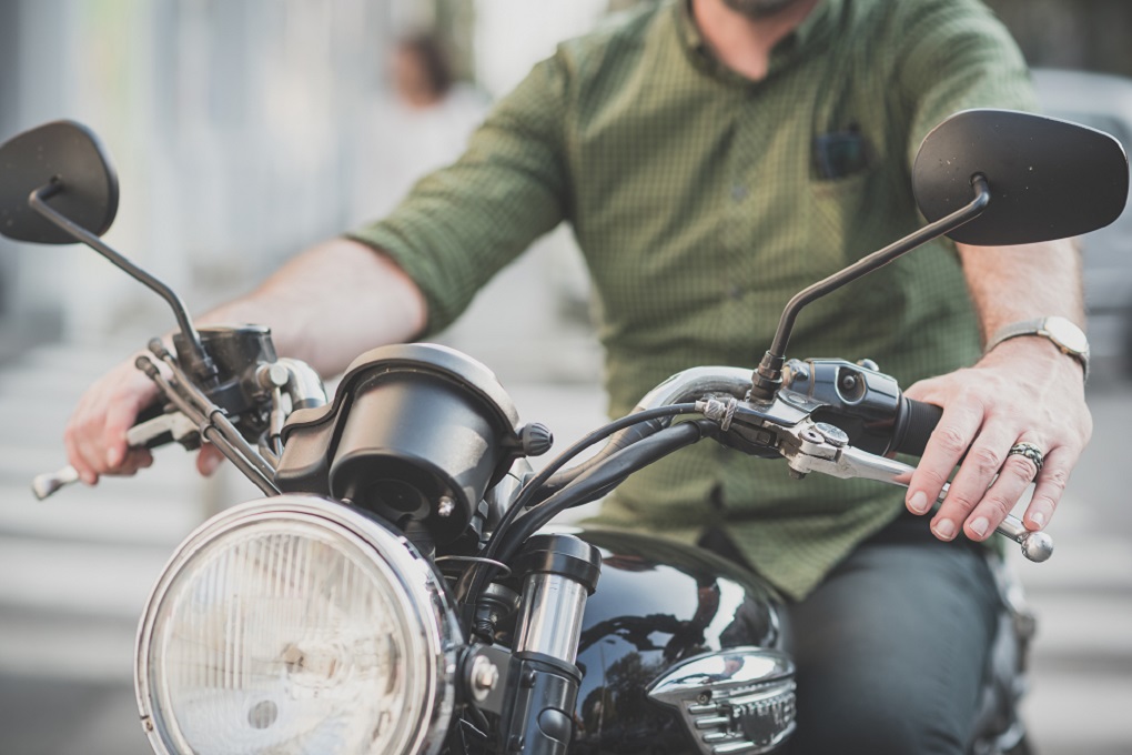 Middle Aged Man Motorcyclist in the City